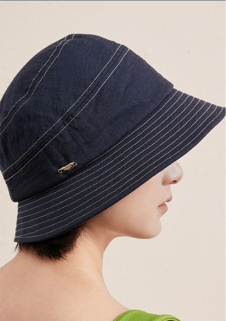 Denim blue short brim bucket hat floating product image, lightweight packable bucket hat