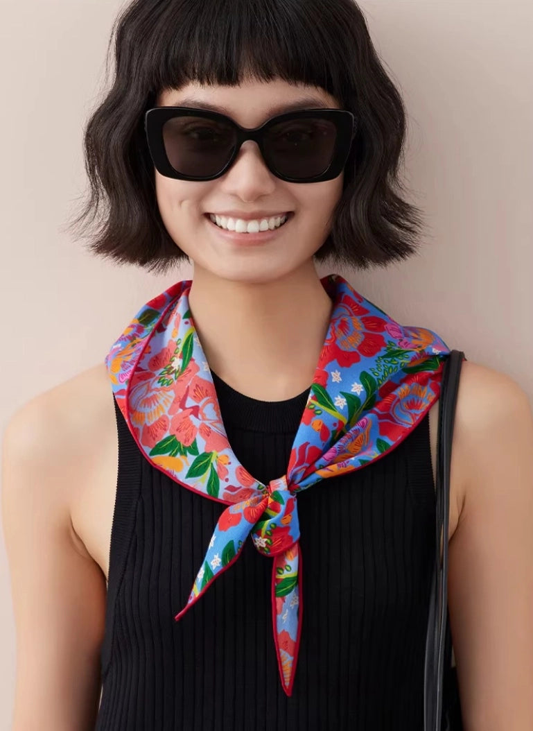 close-up of floral silk triangle scarf elegant neck scarf styling
