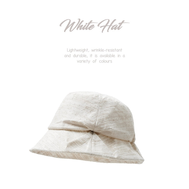 white cotton linen bucket hat product display minimal style