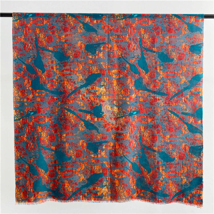 Teal and red peacock print 100% wool scarf displayed flat, showing the full flame motif and fringed edges