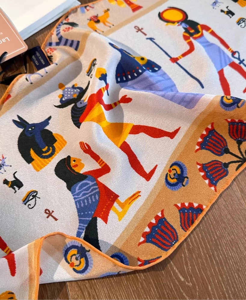 Close-up of tribal print silk scarf, mulberry silk texture and pattern detail