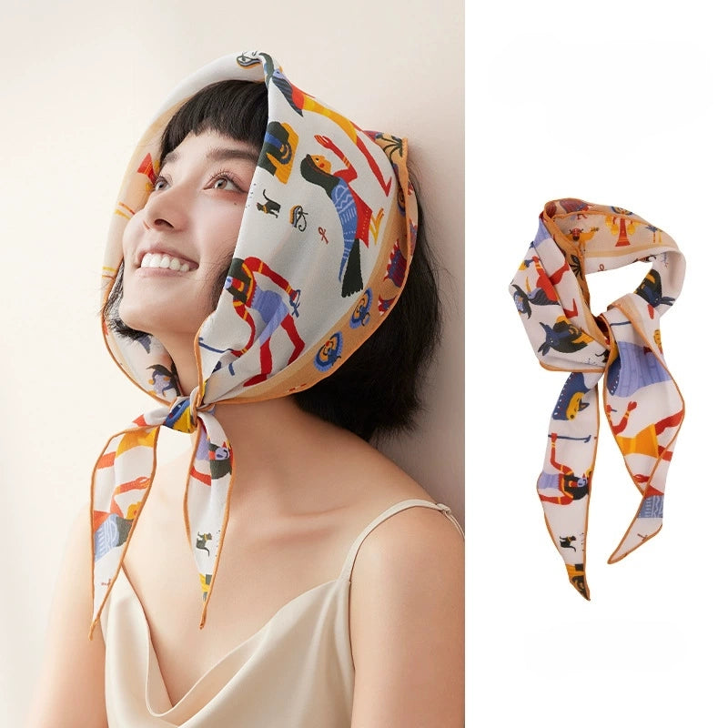 Tribal print silk scarf worn as a head scarf, mulberry silk triangle head scarf styling