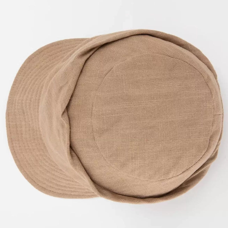 Top view of light khaki cotton linen vintage beret hat with round crown