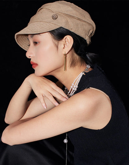 Side profile of light khaki cotton linen beret hat for women with short brim
