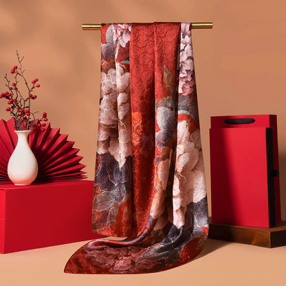 Burgundy vintage floral silk scarf in a long oblong shape with refined print and smooth mulberry silk texture.