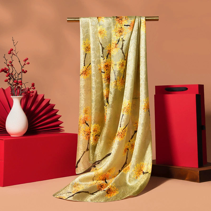 Soft yellow floral silk scarf made from 100% mulberry silk with graceful vintage styling.