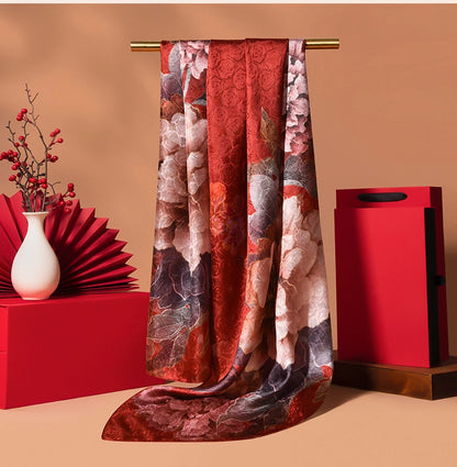 Burgundy floral 100% mulberry silk scarf with vintage pattern, smooth feel, and refined long silhouette.