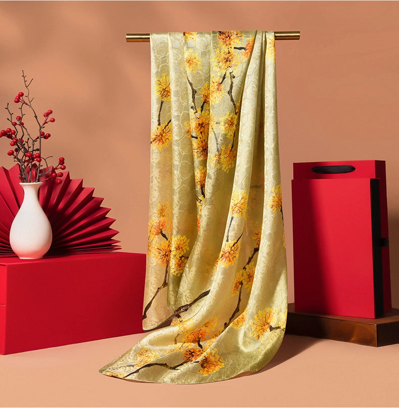 Soft yellow Chinoiserie silk scarf with floral print, lightweight drape, and timeless feminine elegance.