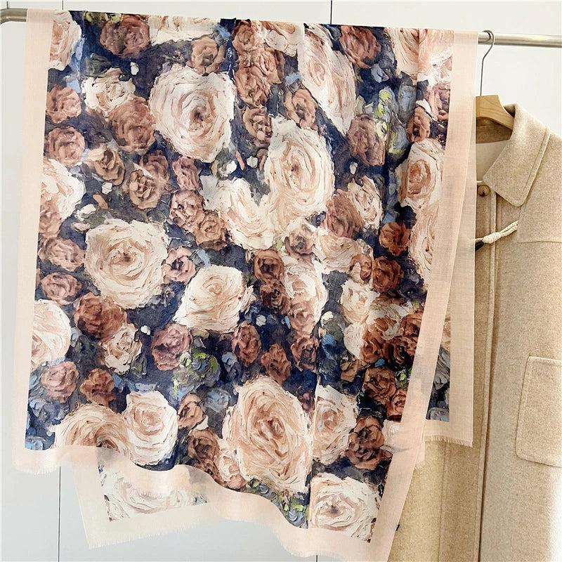 Vintage rose printed 100% wool scarf displayed beside a beige coat, showing the oversized floral pattern