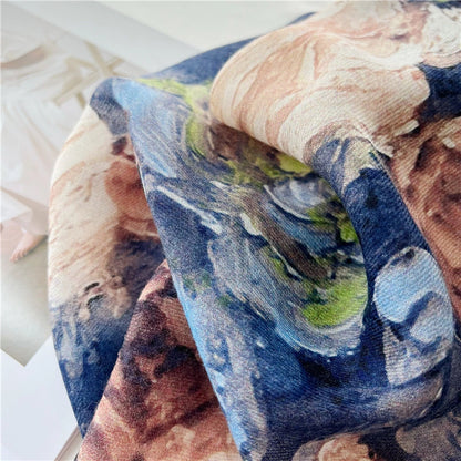 Detail of blue and ivory rose print on the soft semi-sheer vintage floral wool scarf