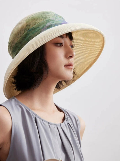 Side view of vintage white wide brim sun hat with dome crown and scarf ribbon.