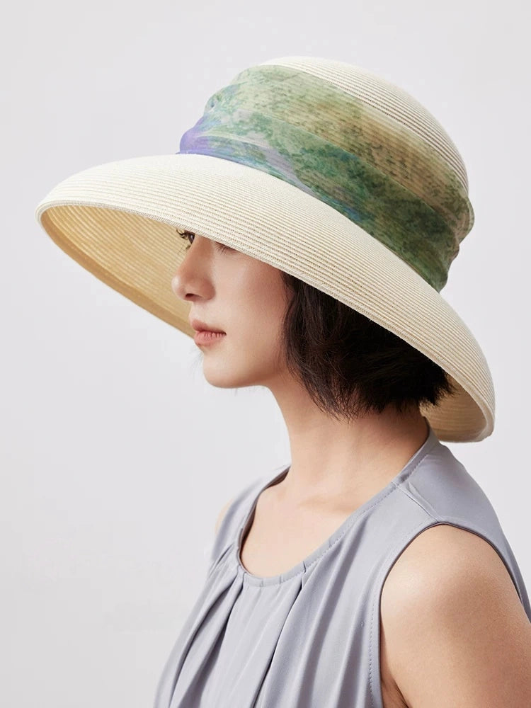 Vintage white lampshade sun hat with artistic scarf ribbon on woman.