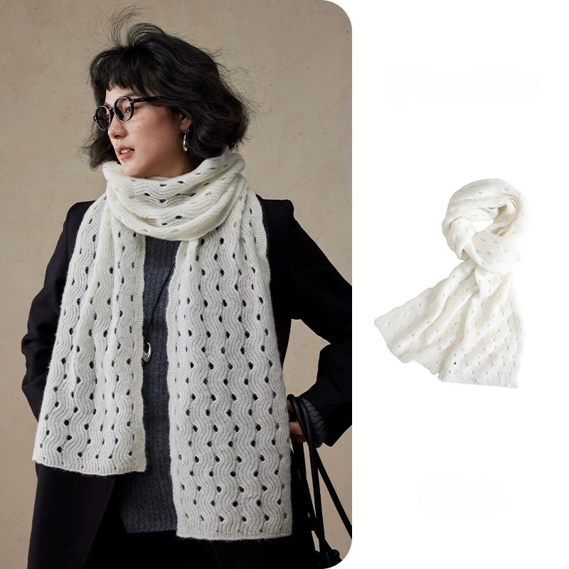 Cream white wave pointelle cashmere scarf worn with a black coat, beside a knotted product view.