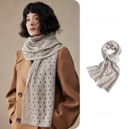 Light khaki wave pointelle cashmere scarf worn with a camel coat, beside a coiled product view.