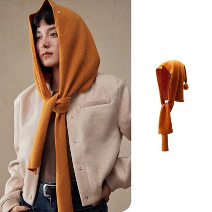 Women's burnt orange wool hooded scarf styled with a beige blazer, with product detail view